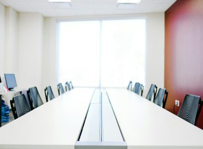 white wooden table with chairs