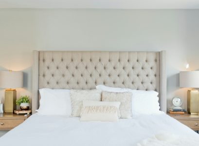 white bed linen with white pillows